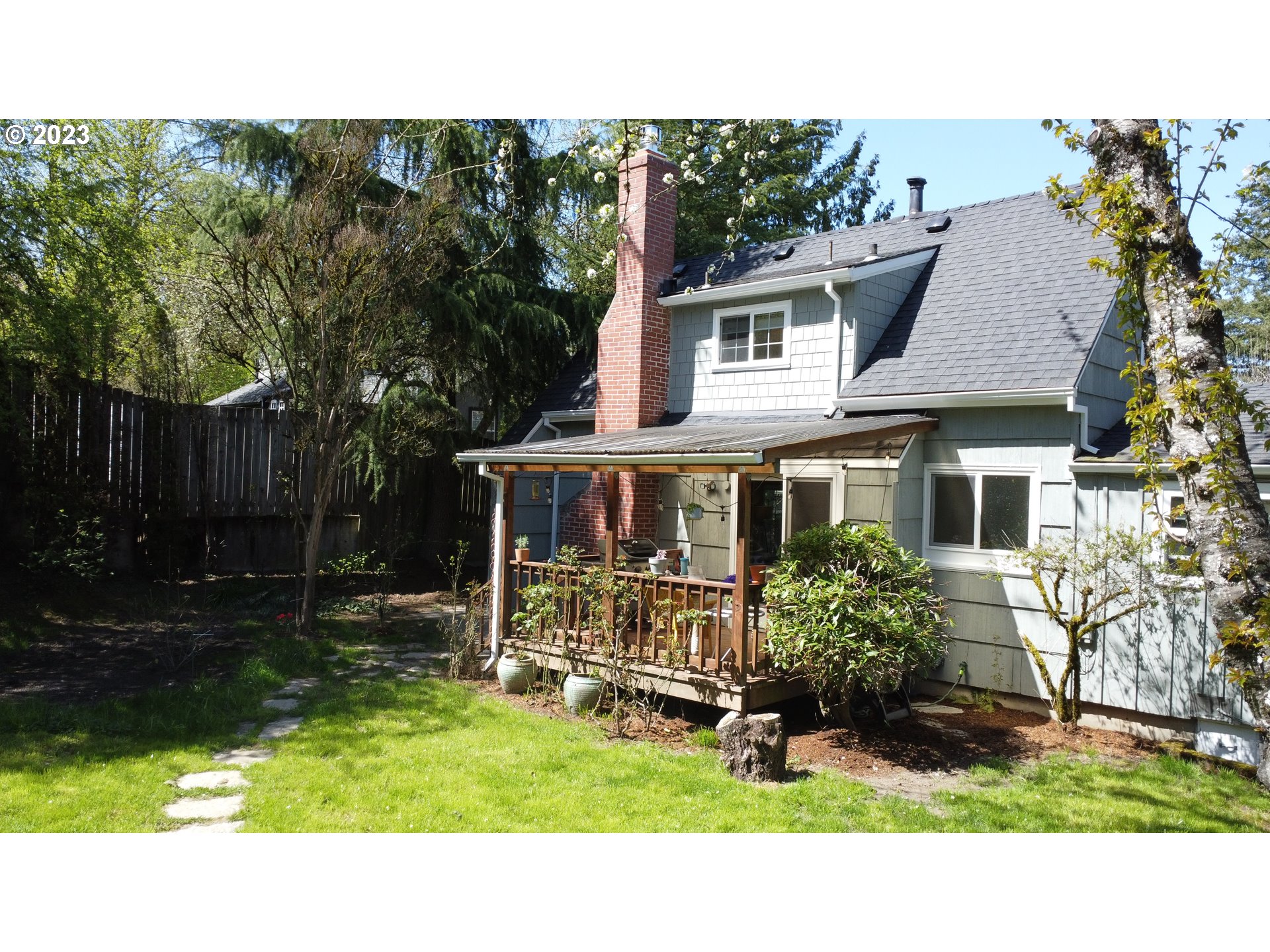 4052 Southwest Huber Street Portland, OR 97219 - Photo 44 of 48 a black and white house with outdoor space