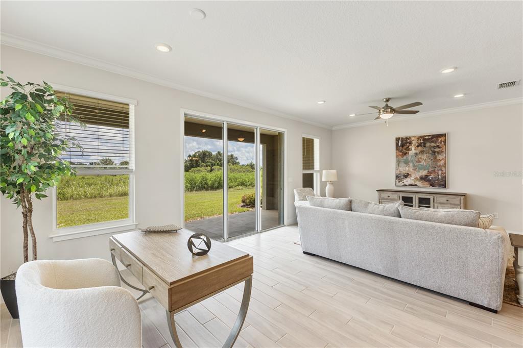 4473 Northwest 53rd Avenue Road Ocala, FL 34482 - Photo 22 of 40 a living room with furniture and a large window