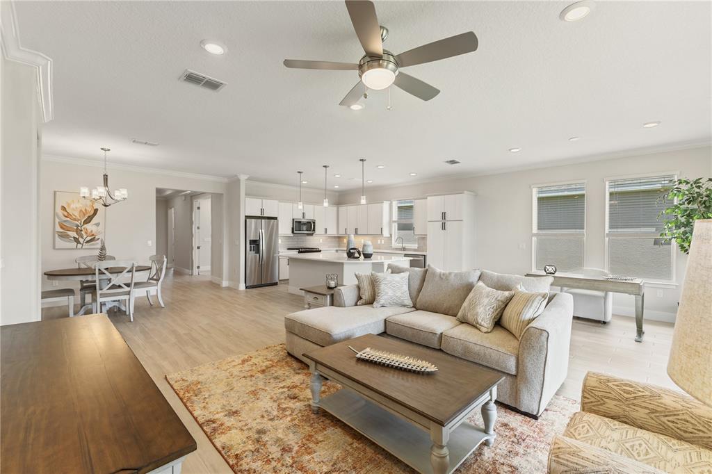 4473 Northwest 53rd Avenue Road Ocala, FL 34482 - Photo 24 of 40 a living room with furniture and view of kitchen