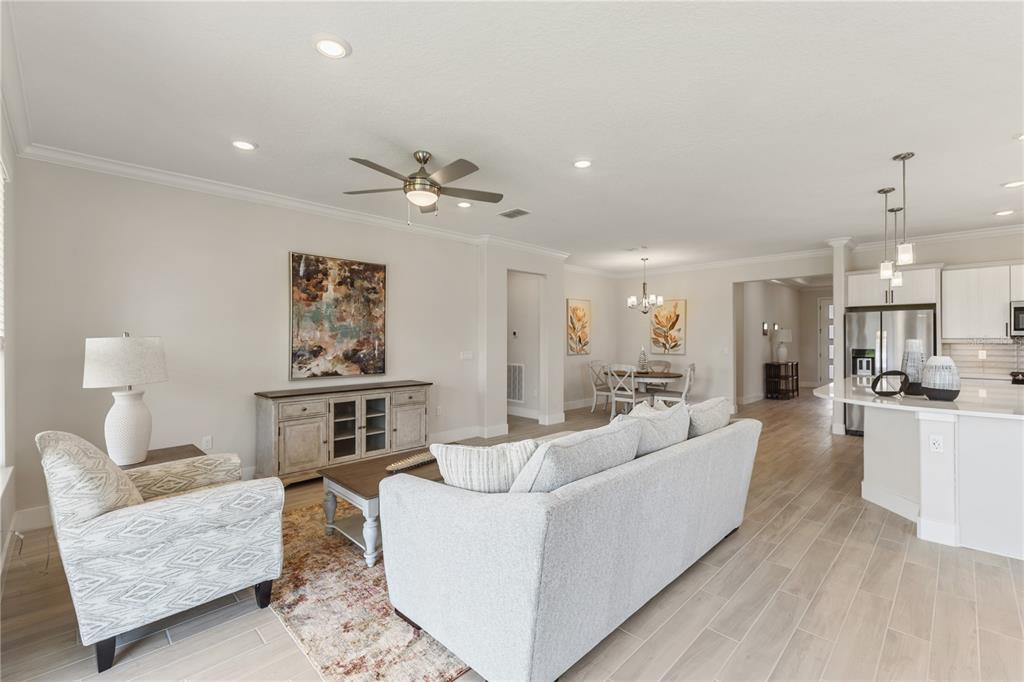4473 Northwest 53rd Avenue Road Ocala, FL 34482 - Photo 25 of 40 a living room with furniture and a fireplace
