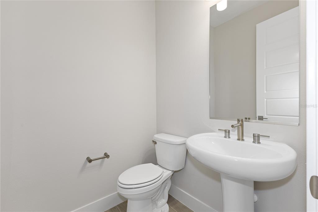 4473 Northwest 53rd Avenue Road Ocala, FL 34482 - Photo 38 of 40 a bathroom with a sink and a toilet