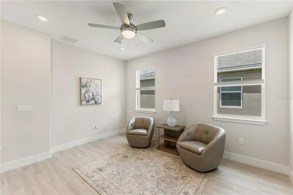 a living room with furniture and a window