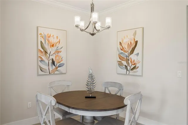 a dining room with table and chair