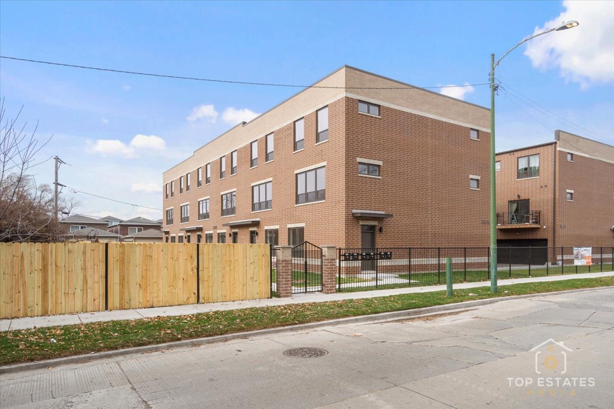 3638 South Western Avenue, Unit F Chicago, IL 60632 - Photo 2 of 36 a front view of a building with street