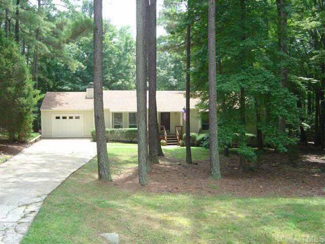 9821 Gralyn Road Raleigh, NC 27613 - Photo 1 of 1 a house view with a backyard space