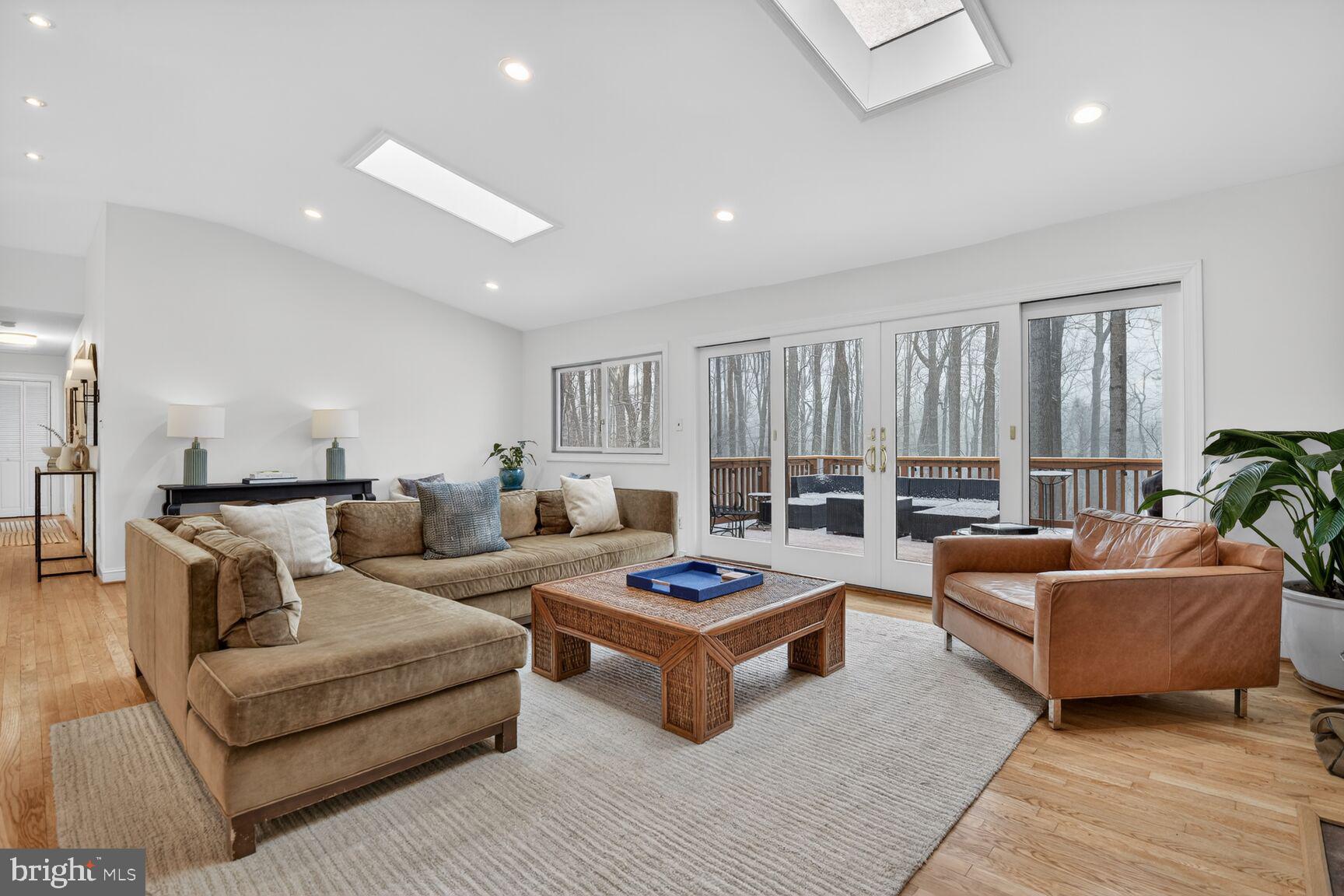 10209 Lloyd Road Potomac, MD 20854 - Photo 4 of 29 a living room with furniture rug and window