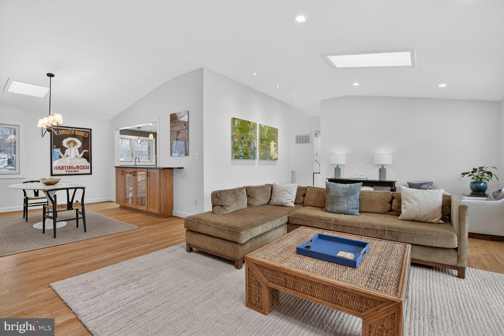 10209 Lloyd Road Potomac, MD 20854 - Photo 7 of 29 a living room with furniture and a wooden floor
