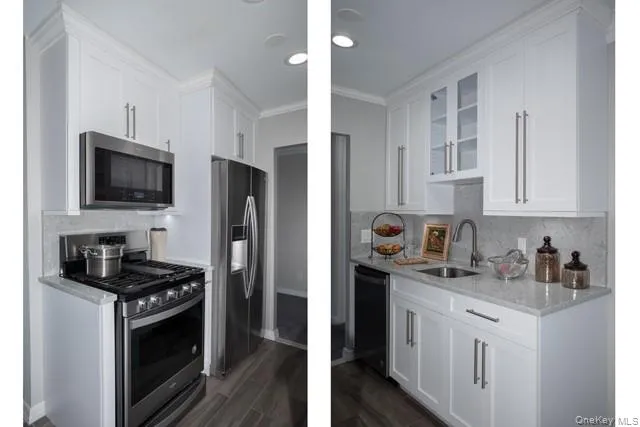 a kitchen with stainless steel appliances a stove a sink a refrigerator and cabinets