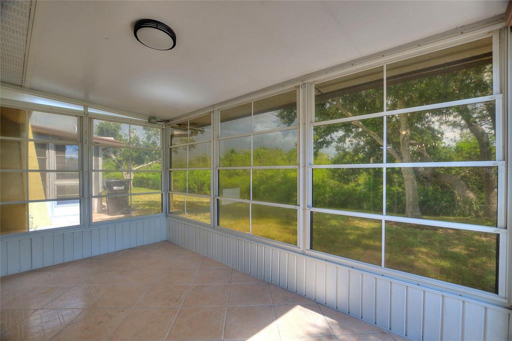 1950 Settlement Road, Unit 23 Venice, FL 34285 - Photo 22 of 33 a view of an empty room with a window