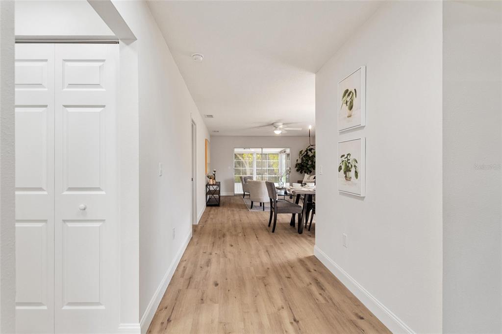 1950 Settlement Road, Unit 23 Venice, FL 34285 - Photo 5 of 33 a view of a livingroom with furniture and wooden floor