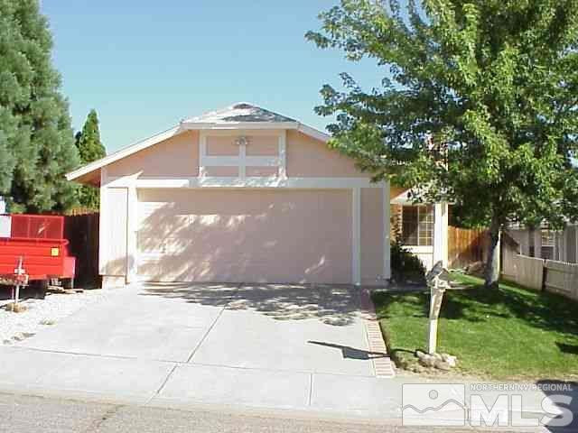 6283 Chesterfield Lane Reno, NV 89523 - Photo 1 of 1 a front view of a house with a yard