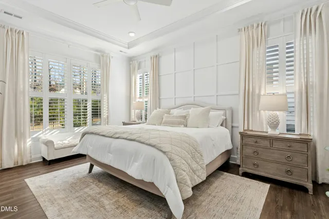 a bed room with a bed and a window