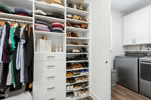 a kitchen with a sink a stove and a microwave