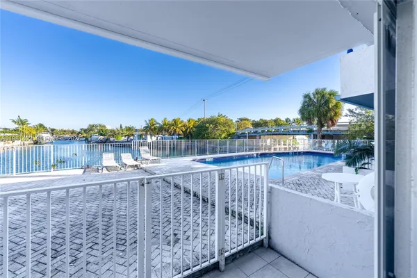 a terrace view with two chairs