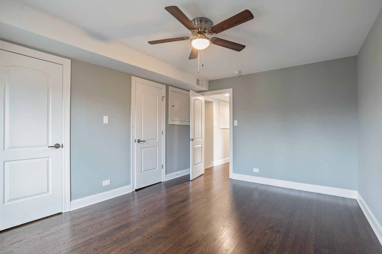 1900 Brophy Avenue Park Ridge, IL 60068 - Photo 13 of 27 an empty room with wooden floor and windows