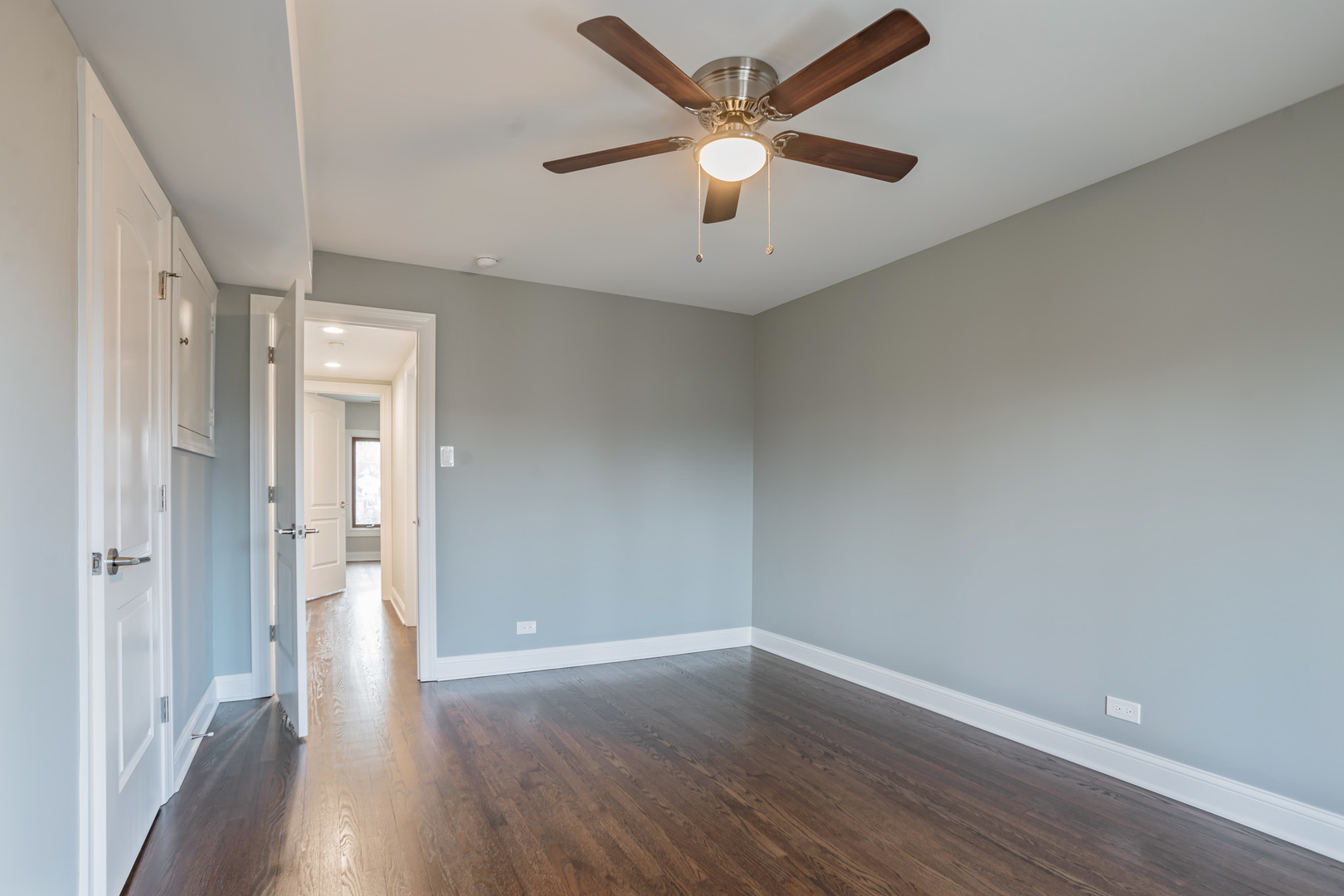 1900 Brophy Avenue Park Ridge, IL 60068 - Photo 14 of 27 an empty room with wooden floor and windows