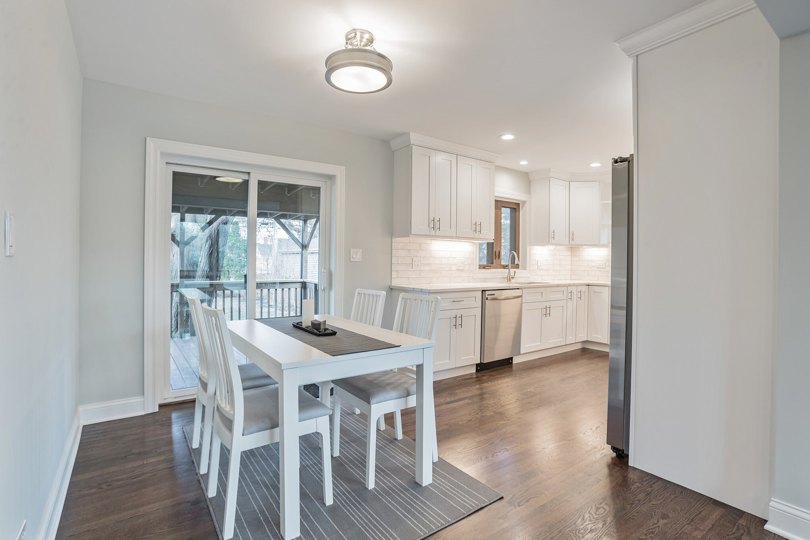1900 Brophy Avenue Park Ridge, IL 60068 - Photo 8 of 27 a view of a dining room with furniture and wooden floor