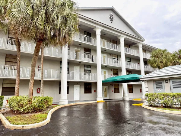 a front view of a building with balcony