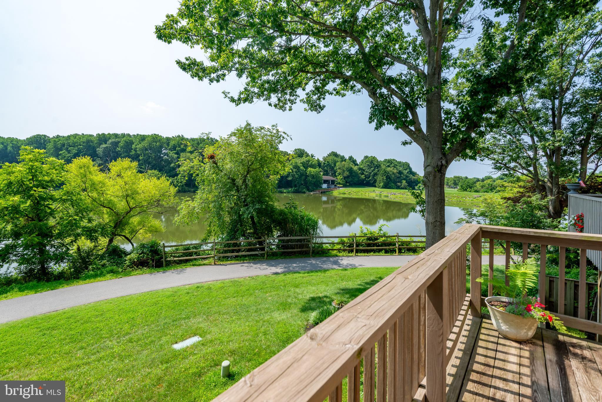 7261 Dockside Lane Columbia, MD 21045 - Photo 13 of 68 a view of a wooden deck and garden
