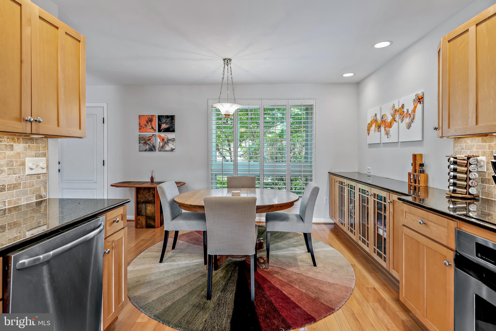 7261 Dockside Lane Columbia, MD 21045 - Photo 23 of 68 a view of a dining room with furniture window and outside view