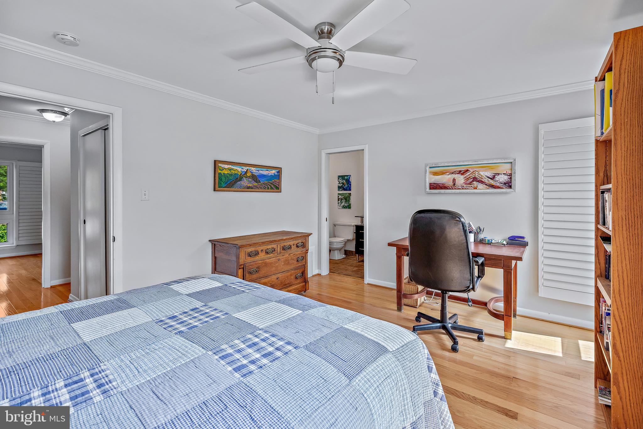 7261 Dockside Lane Columbia, MD 21045 - Photo 33 of 68 a bedroom with a bed and a chandelier