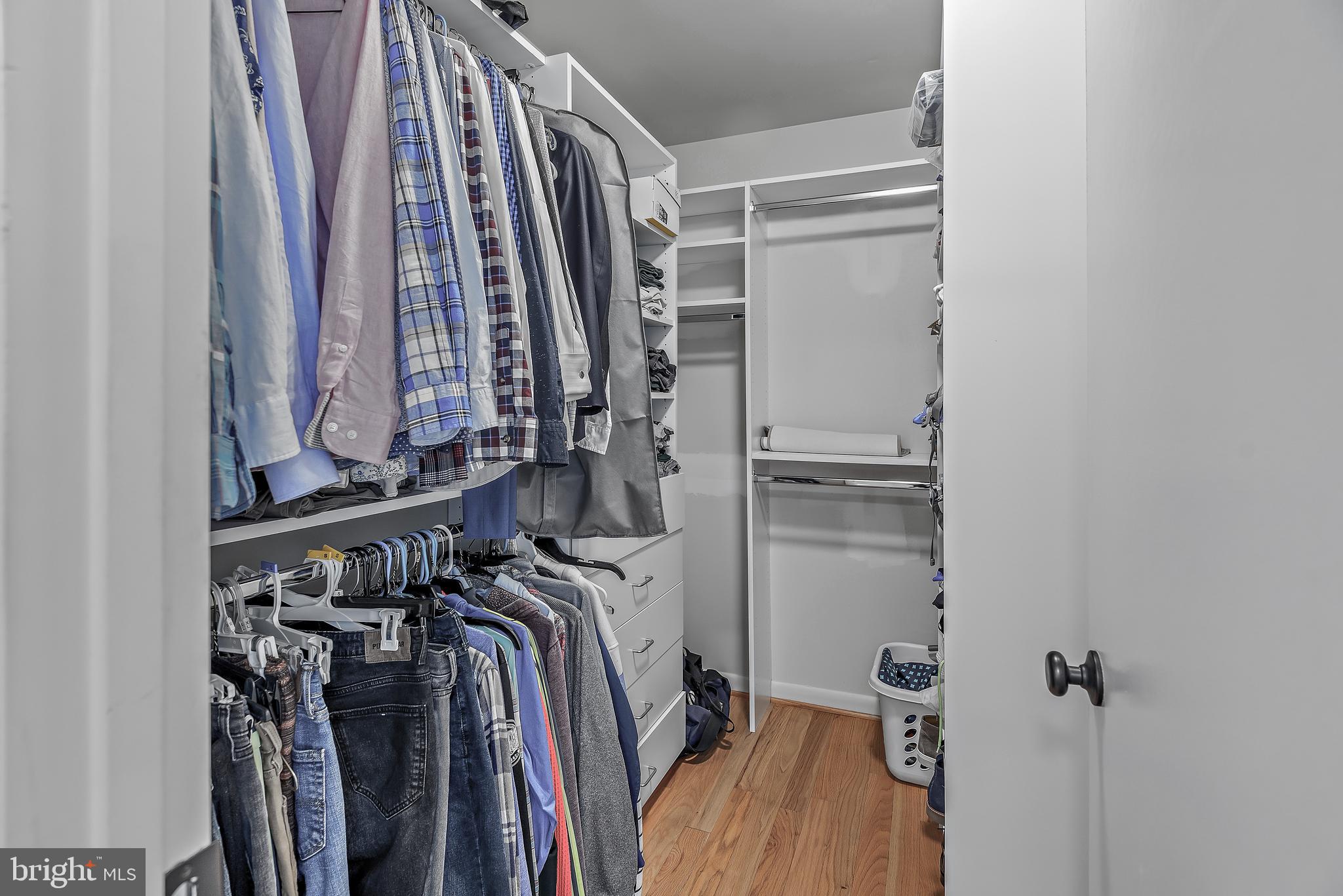 7261 Dockside Lane Columbia, MD 21045 - Photo 38 of 68 a view of walk in closet with clothes