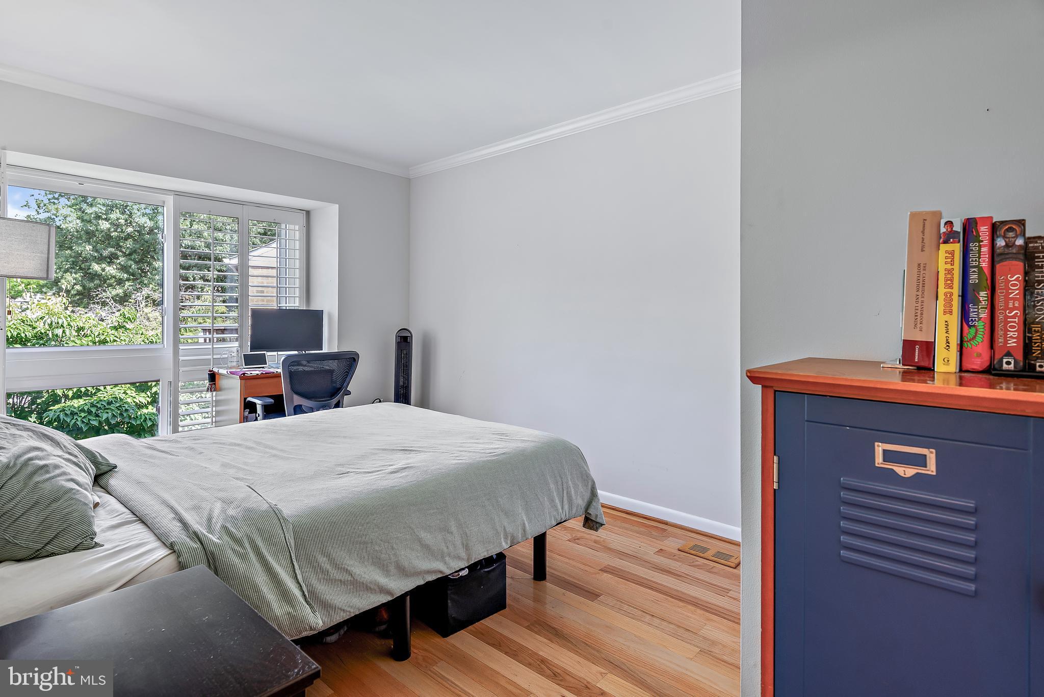 7261 Dockside Lane Columbia, MD 21045 - Photo 39 of 68 a bedroom with a bed and a window