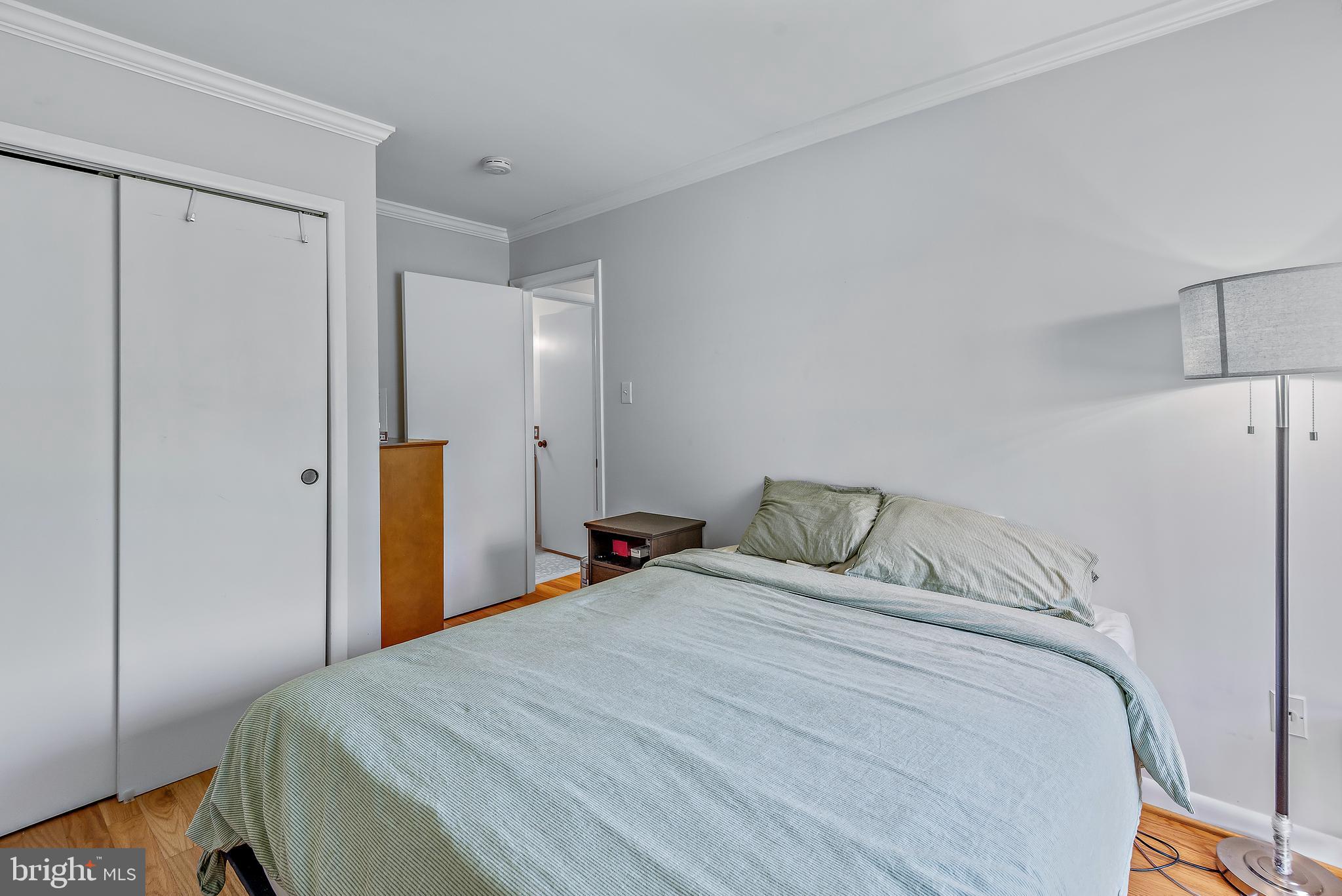 7261 Dockside Lane Columbia, MD 21045 - Photo 41 of 68 a bedroom with a bed and closet