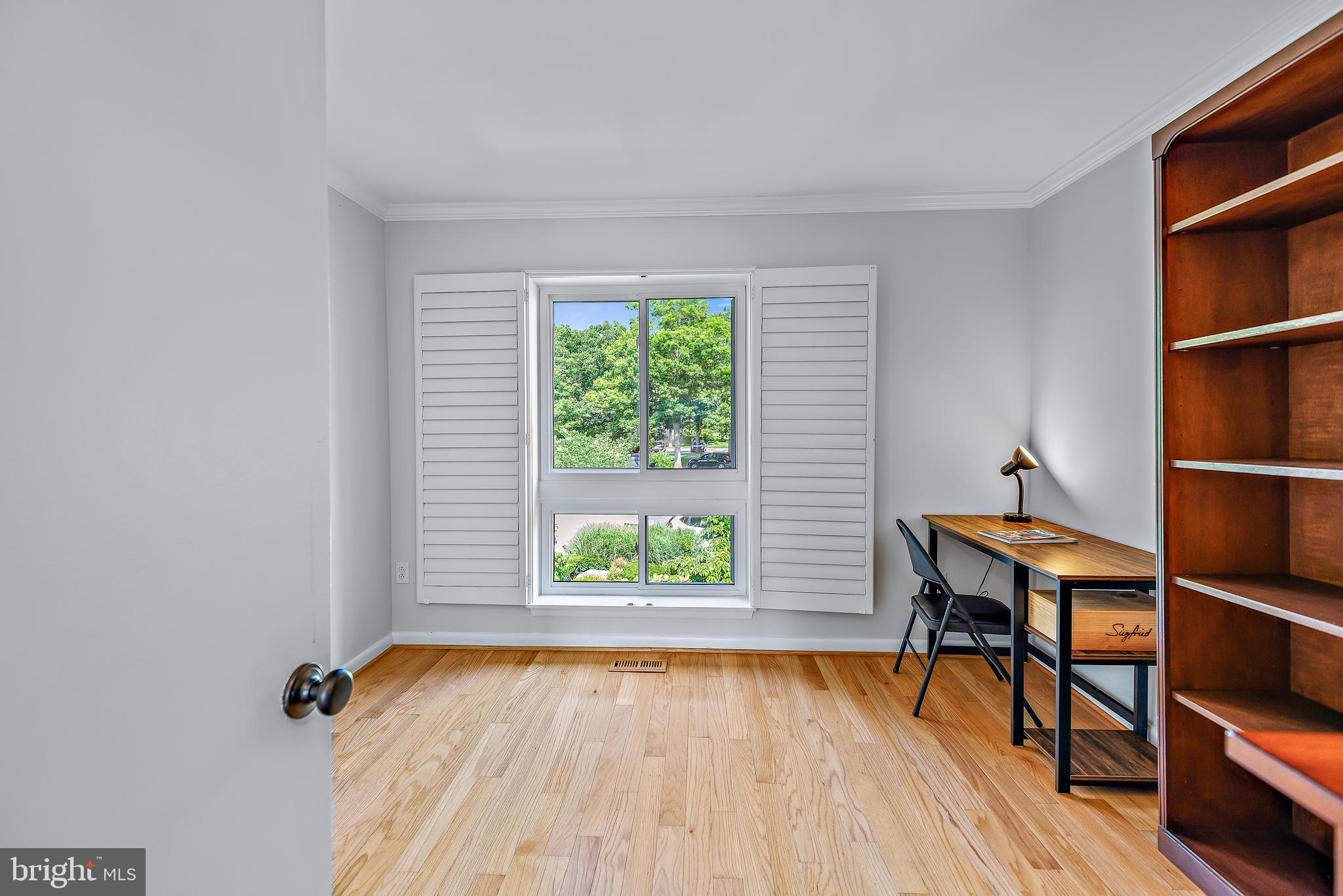 7261 Dockside Lane Columbia, MD 21045 - Photo 45 of 68 a view of a workspace with furniture and a window