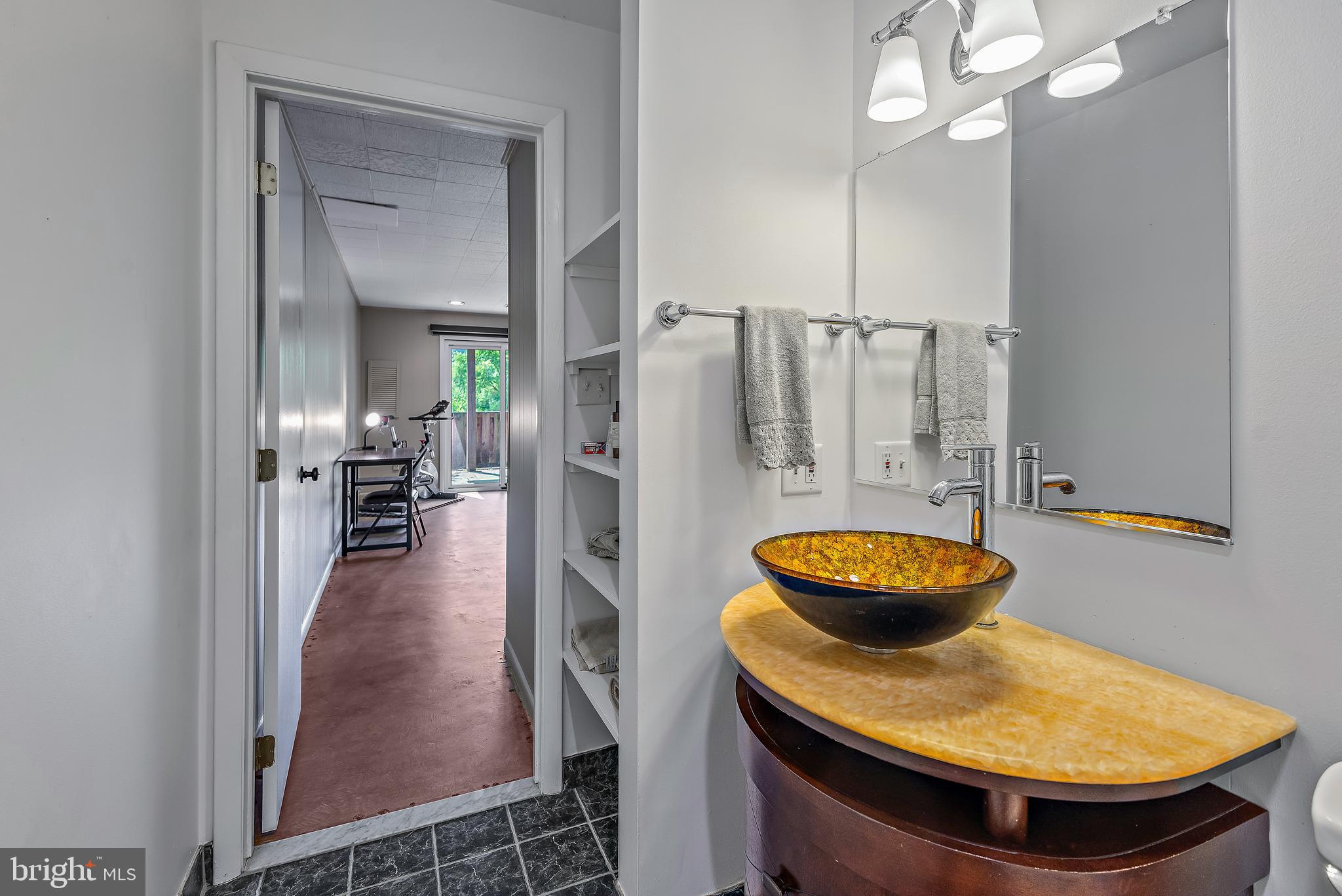 7261 Dockside Lane Columbia, MD 21045 - Photo 56 of 68 a kitchen with stainless steel appliances granite countertop a sink a stove and a refrigerator