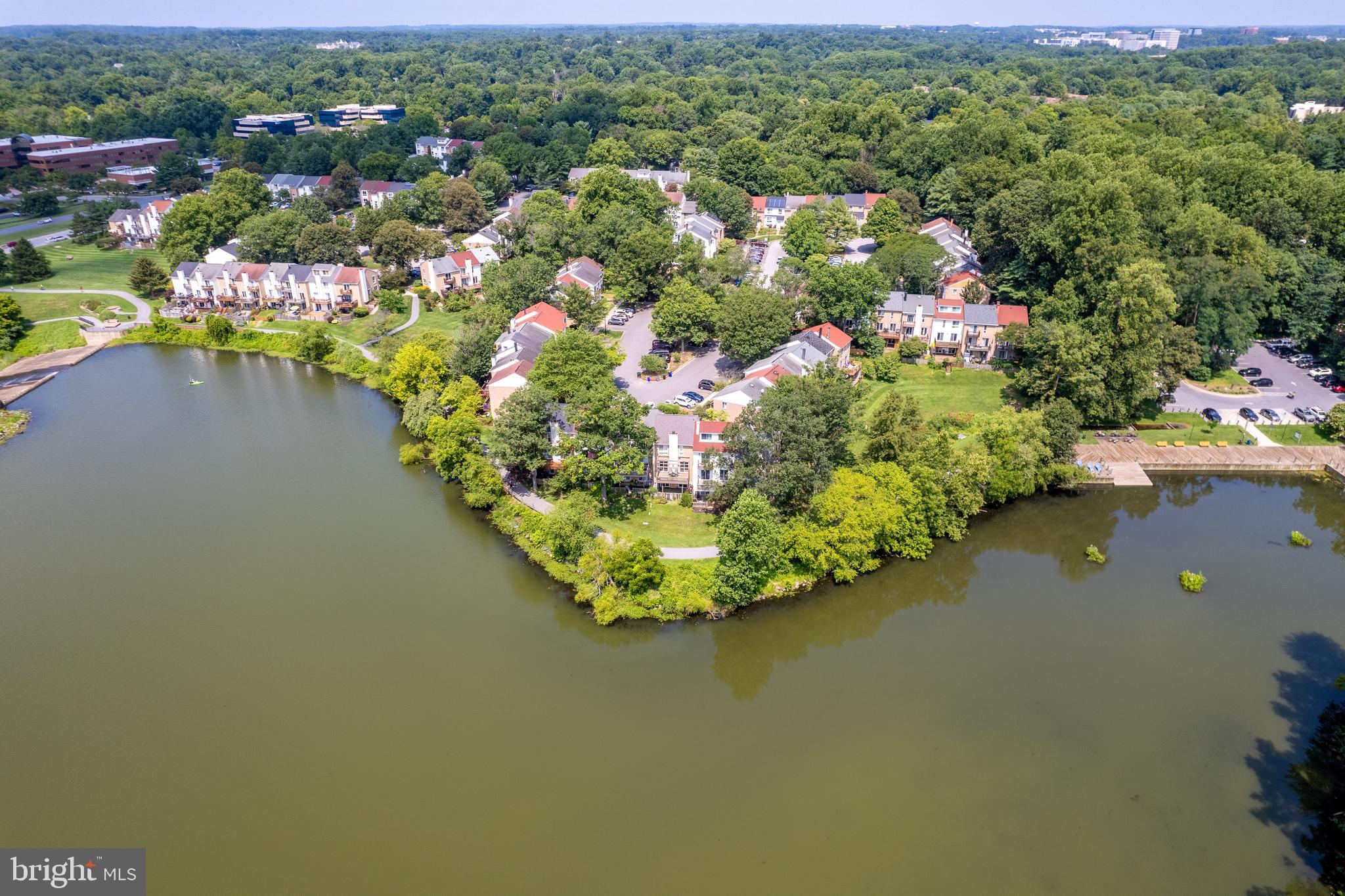 7261 Dockside Lane Columbia, MD 21045 - Photo 59 of 68 a view of a lake with a house