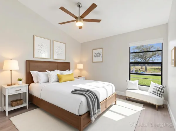 a bedroom with a bed and a couch