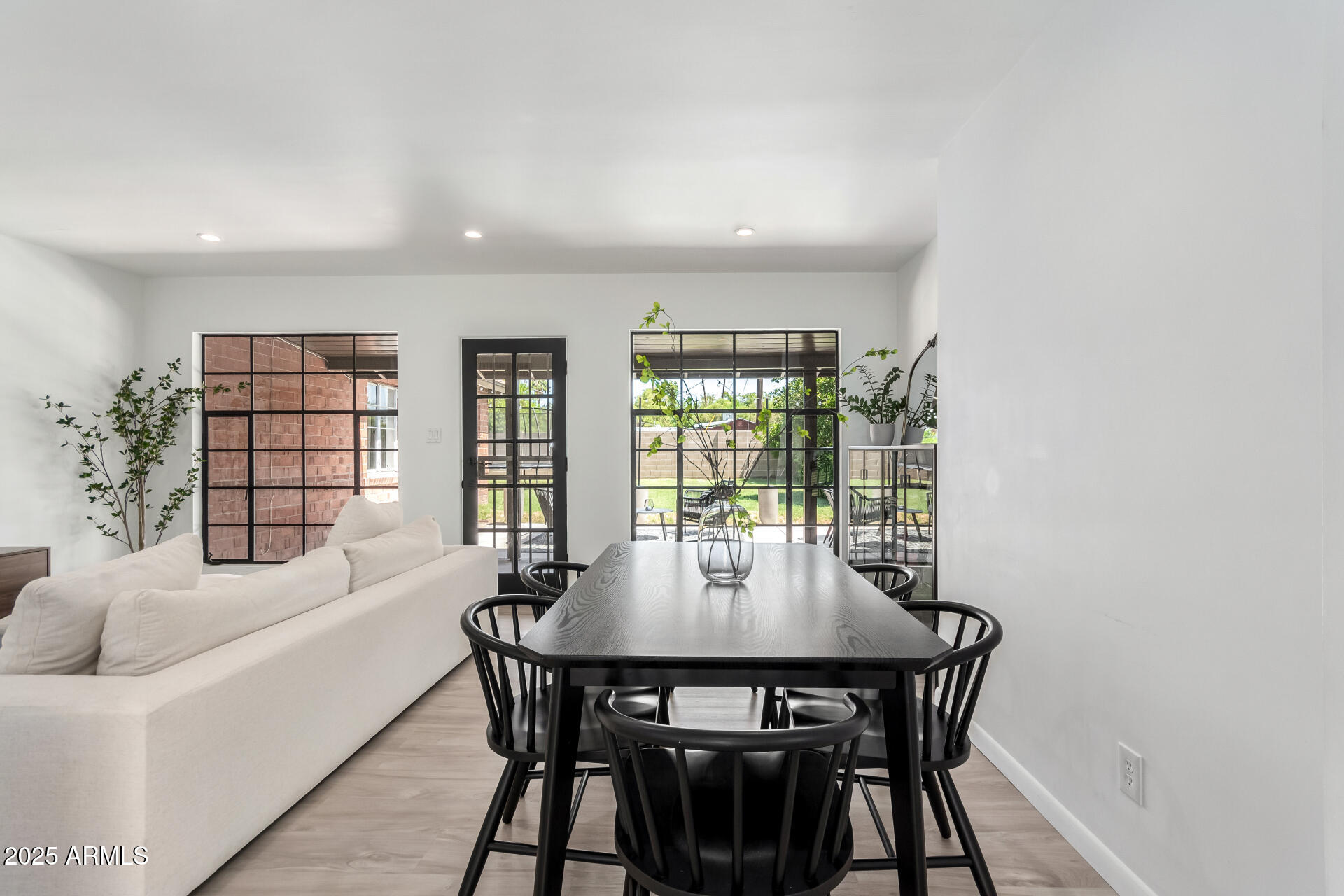 1126 East Lawrence Road Phoenix, AZ 85014 - Photo 8 of 41 a dining room with furniture and window