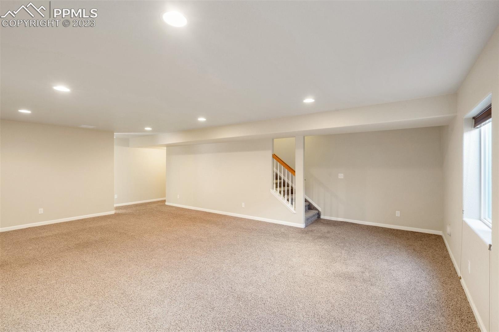 7040 Red Cardinal Loop Colorado Springs, CO 80908 - Photo 16 of 28 Game Room/Family Room in Basement