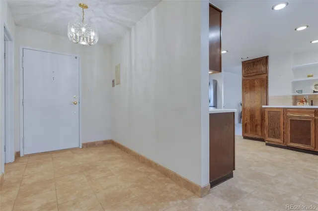 a view of a kitchen with a sink and dishwasher
