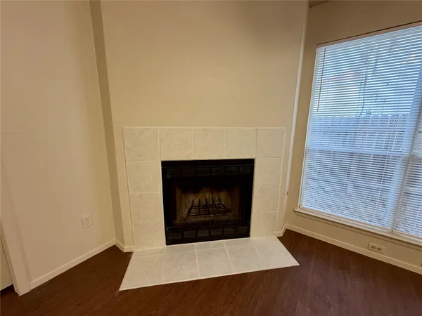 a white building with a fireplace