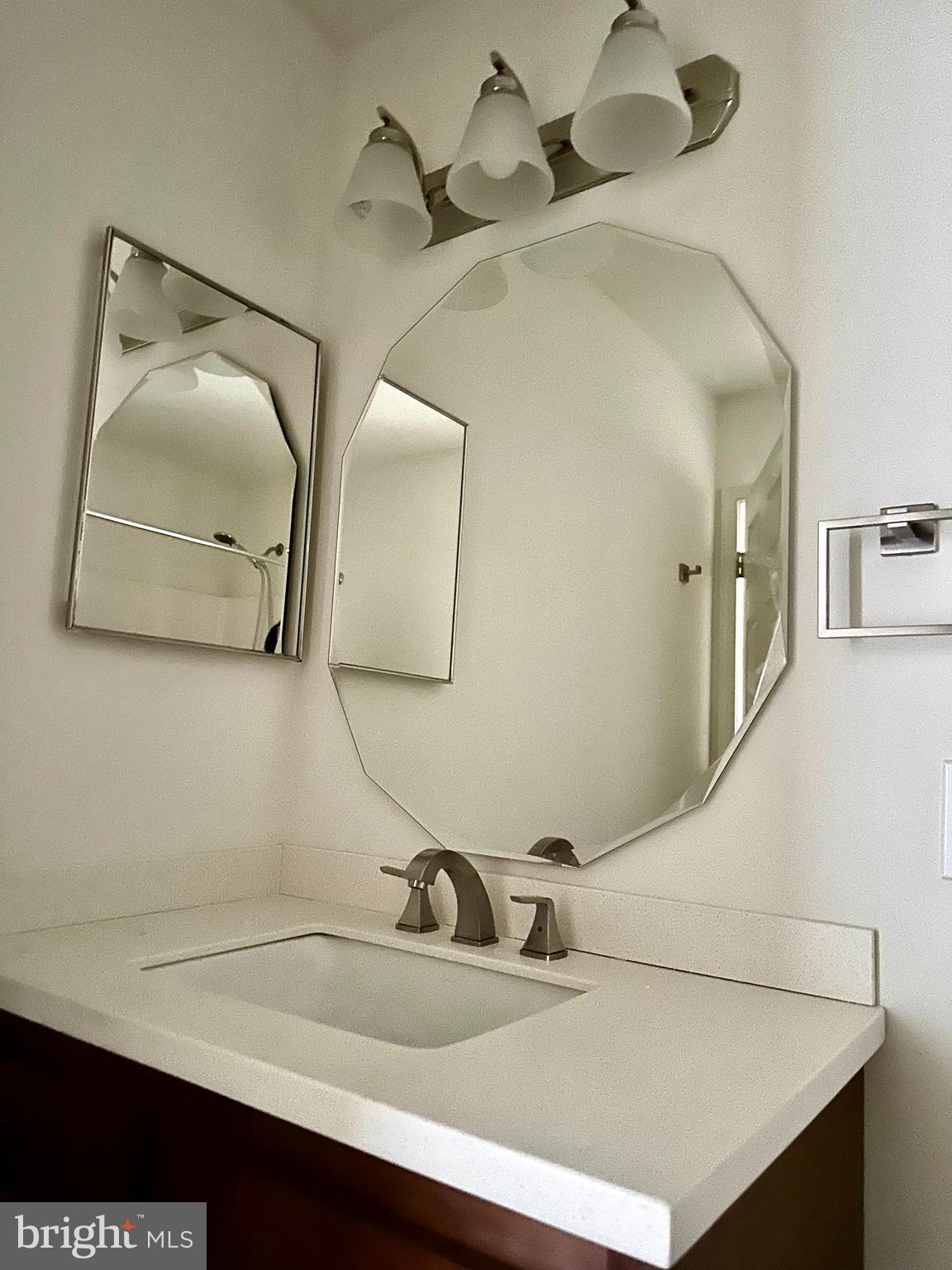 10 Sequoia Drive Berlin, NJ 08009 - Photo 14 of 22 a bathroom with a sink and a mirror