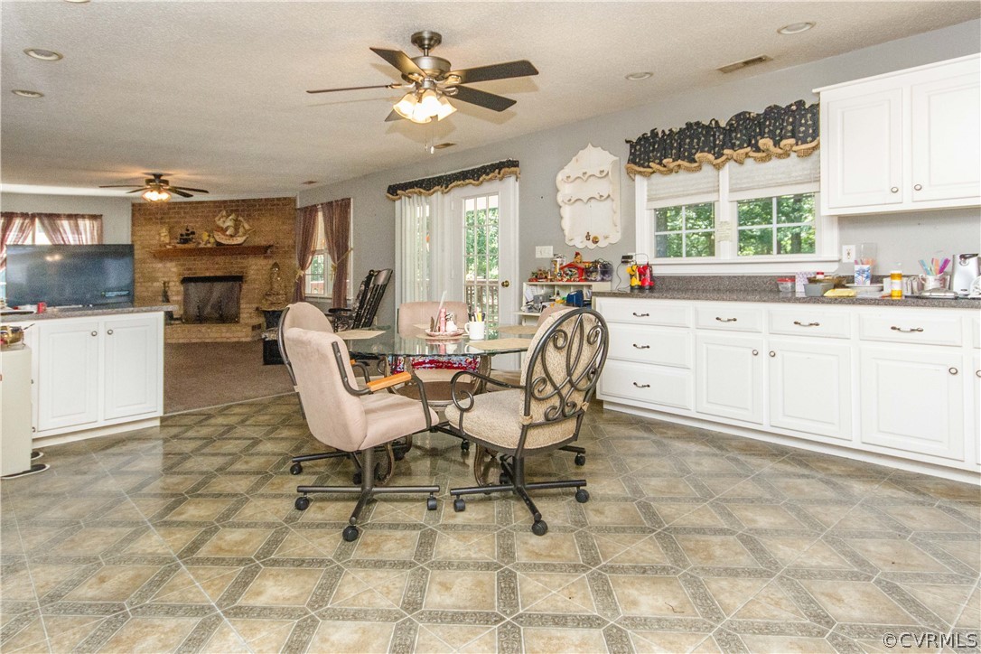 19880 Turkey Ridge Road Carson, VA 23830 - Photo 5 of 20 a view of a dining room with furniture and a chandelier