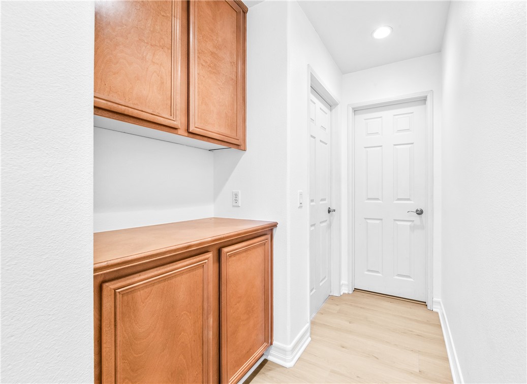 6310 Cosmos Street Eastvale, CA 92880 - Photo 34 of 71 a view of a storage and utility room with cabinet