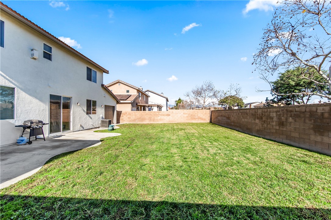 6310 Cosmos Street Eastvale, CA 92880 - Photo 60 of 71 a view of a backyard of the house