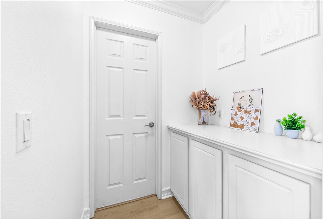 6310 Cosmos Street Eastvale, CA 92880 - Photo 9 of 71 a view of cabinets and wooden floor