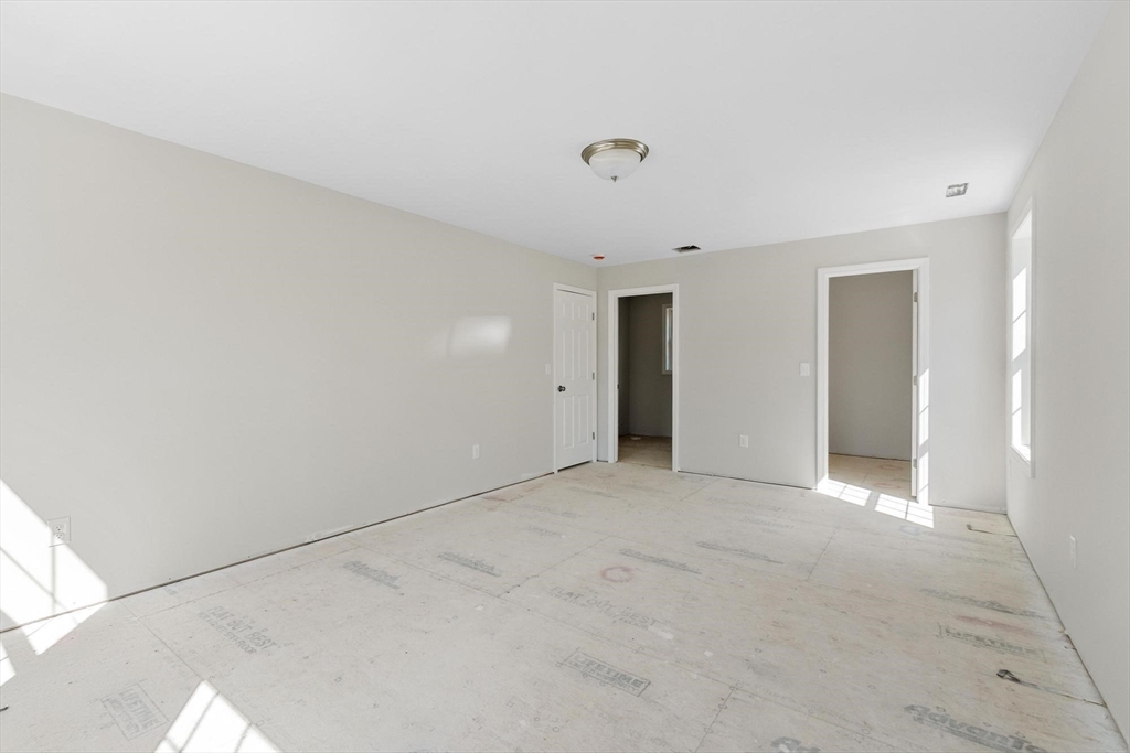 22 Benoit Avenue Pelham, NH 03076 - Photo 16 of 42 a view of an empty room