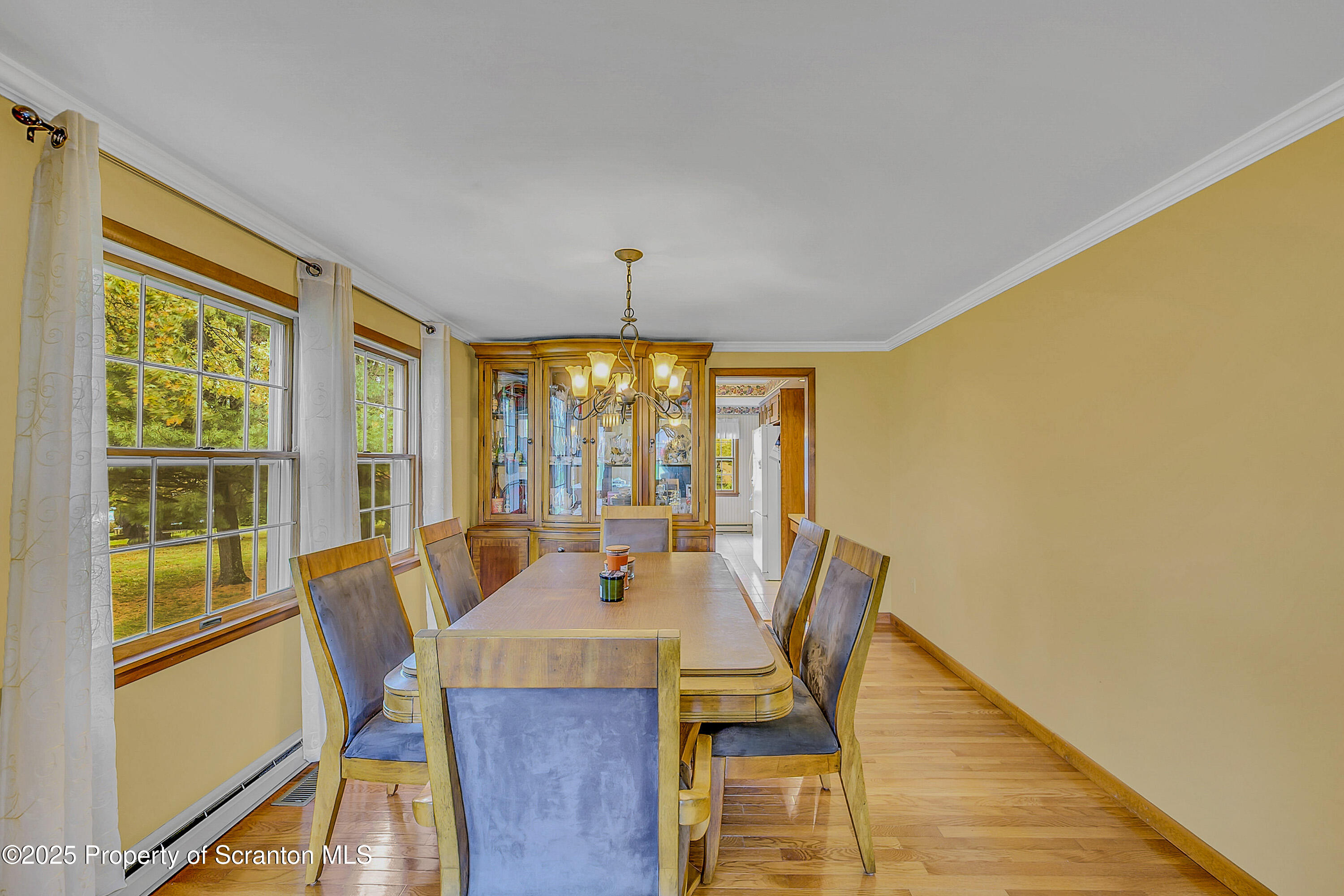 1002 Pheasant Run Road Clarks Summit, PA 18411 - Photo 17 of 53 a view of a dining room with furniture window and outside view
