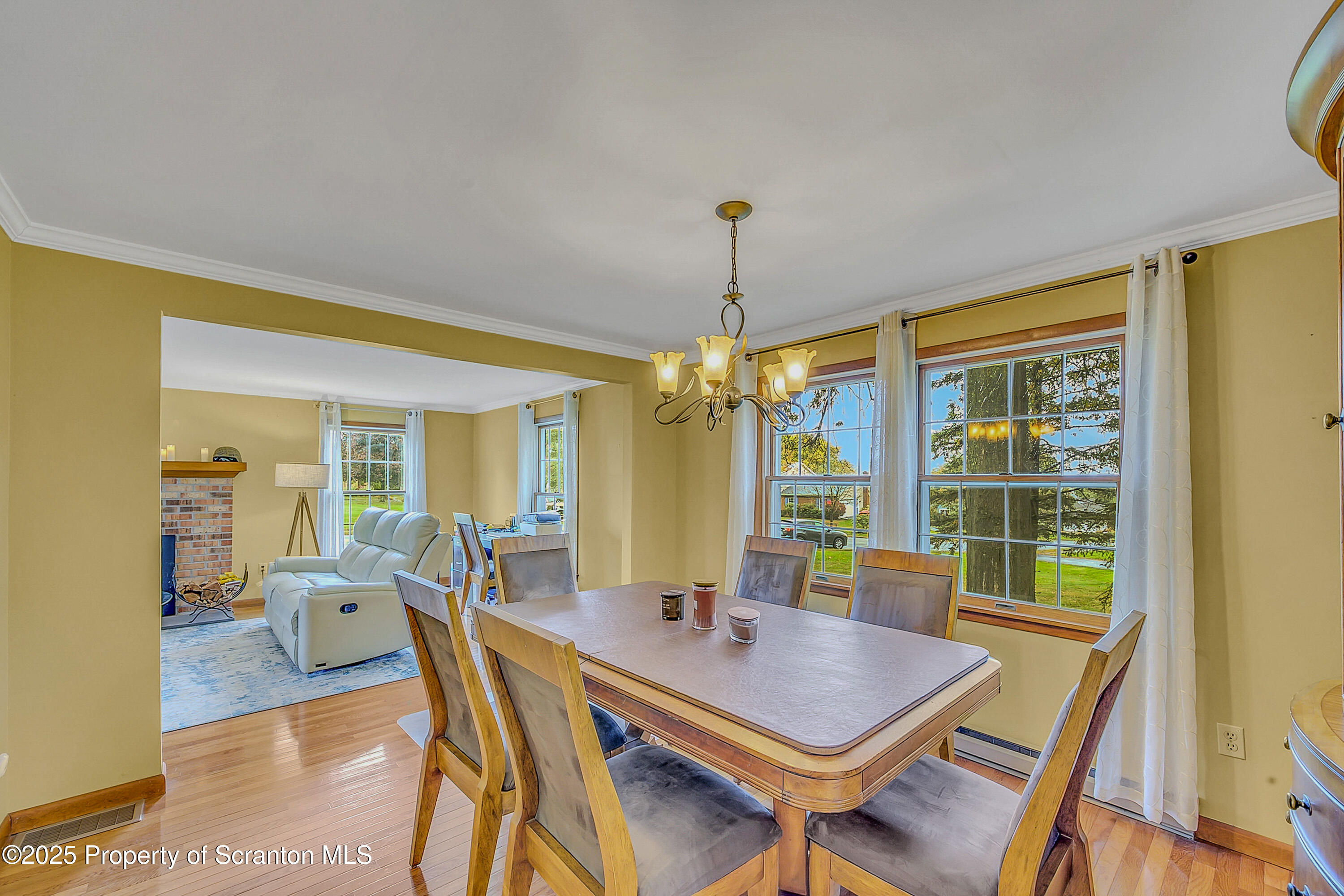 1002 Pheasant Run Road Clarks Summit, PA 18411 - Photo 18 of 53 a view of a dining room with furniture window and wooden floor