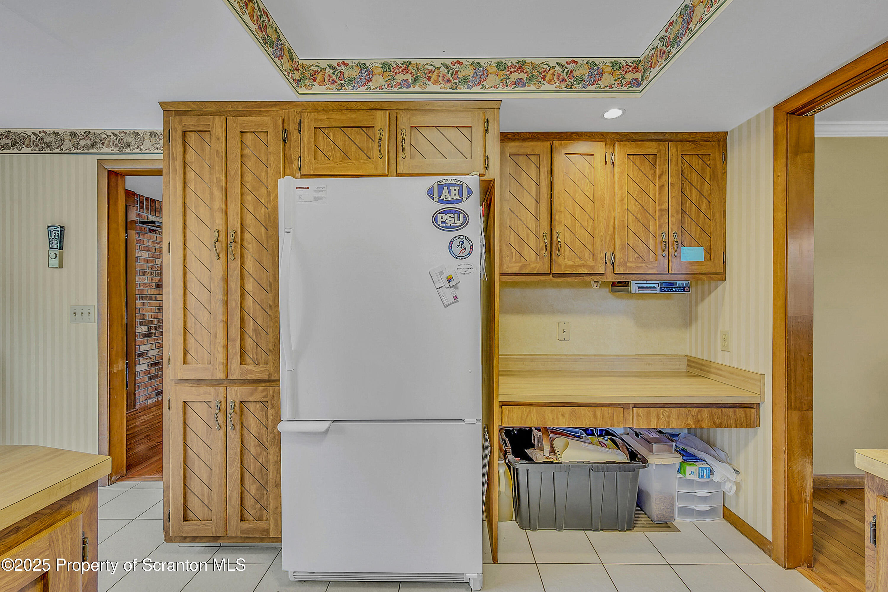 1002 Pheasant Run Road Clarks Summit, PA 18411 - Photo 21 of 53 a bathroom with a refrigerator and a table