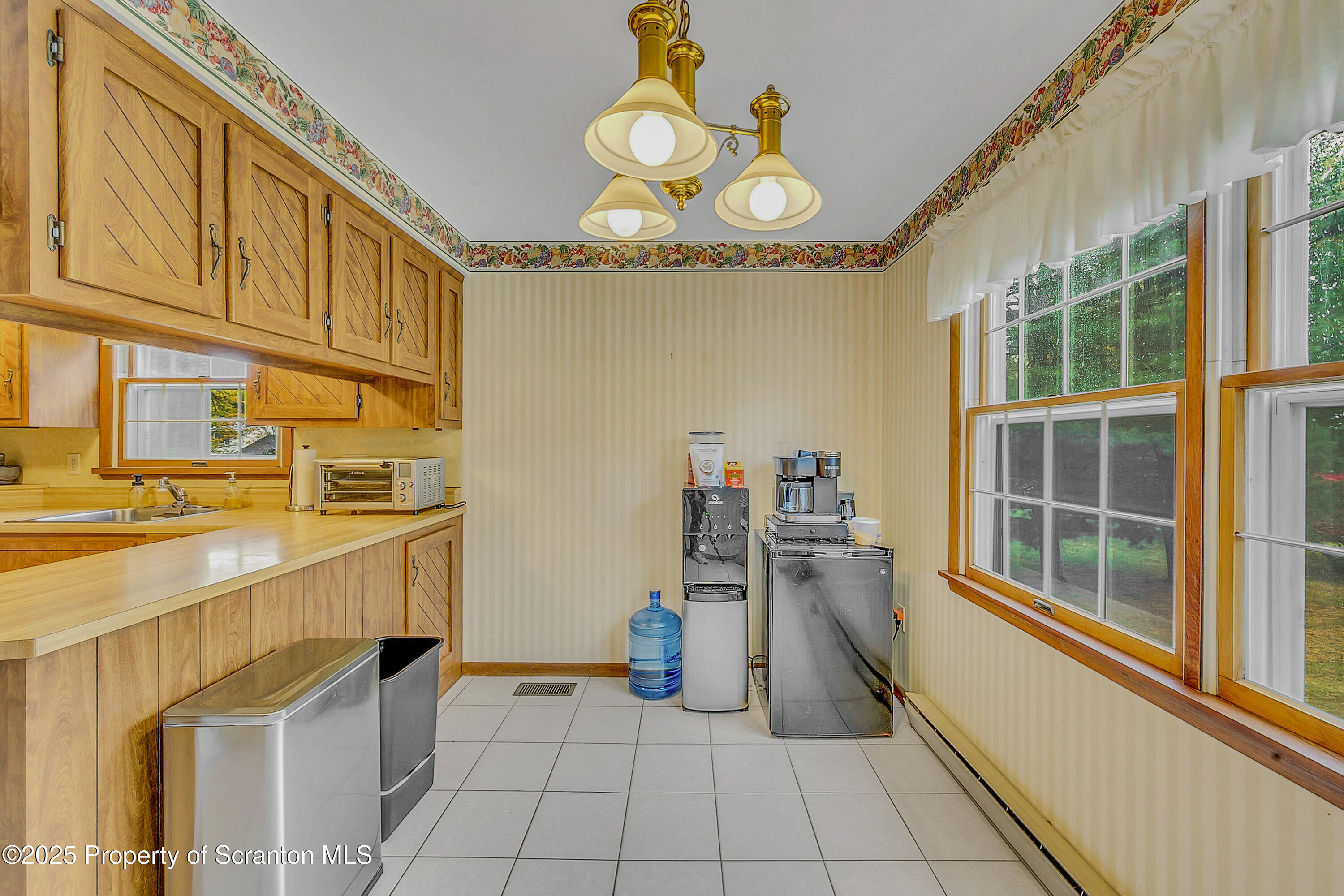 1002 Pheasant Run Road Clarks Summit, PA 18411 - Photo 23 of 53 a view of a kitchen with a sink and dishwasher