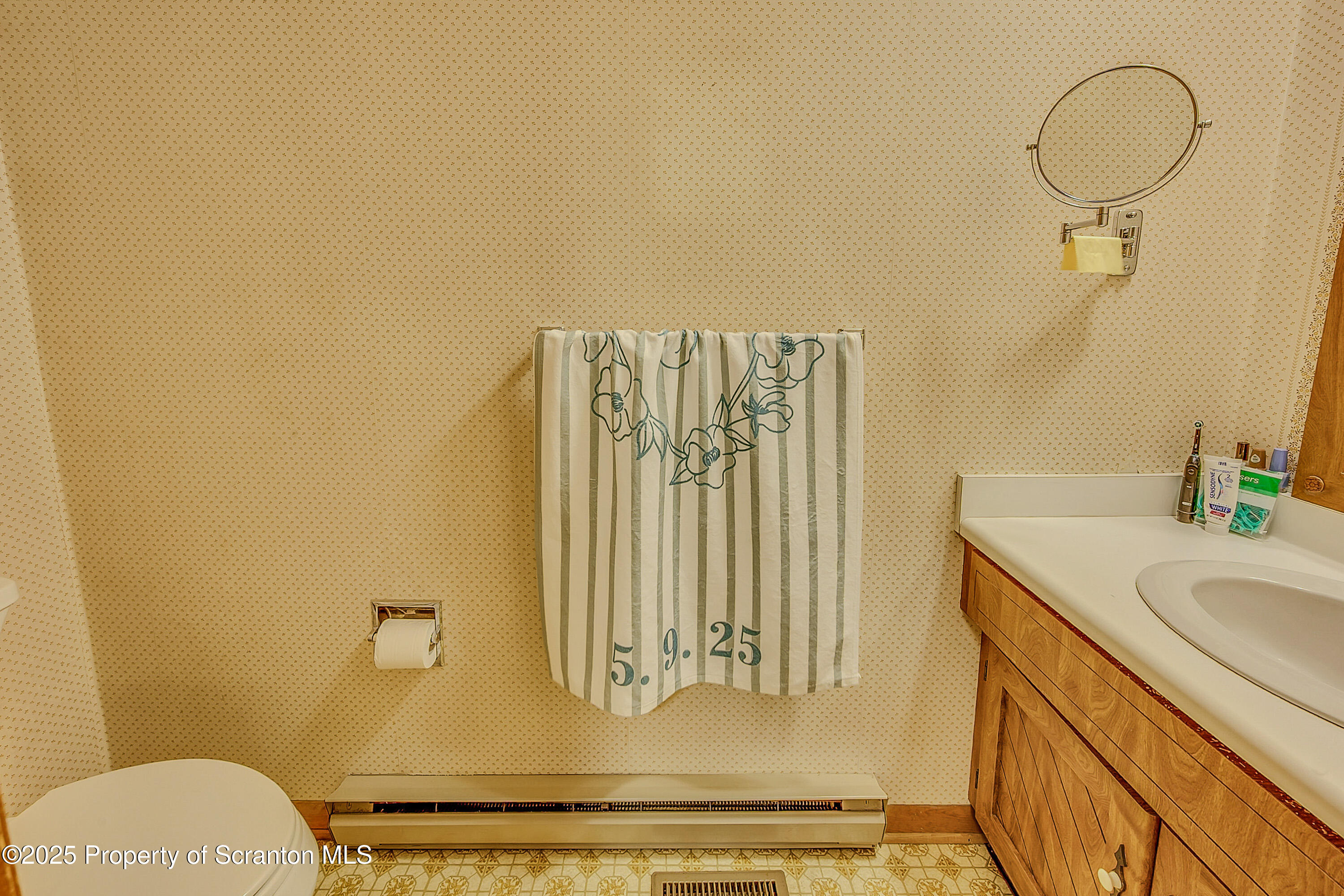 1002 Pheasant Run Road Clarks Summit, PA 18411 - Photo 28 of 53 a bathroom with a granite countertop sink and a mirror