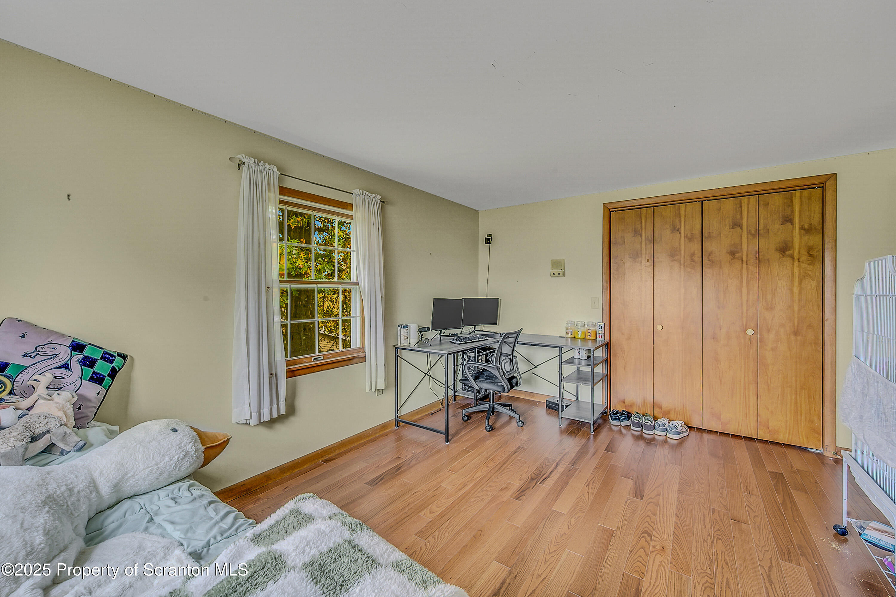 1002 Pheasant Run Road Clarks Summit, PA 18411 - Photo 39 of 53 a workspace with furniture and a window