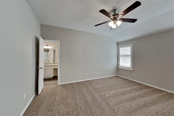 a view of a livingroom with a ceiling fan