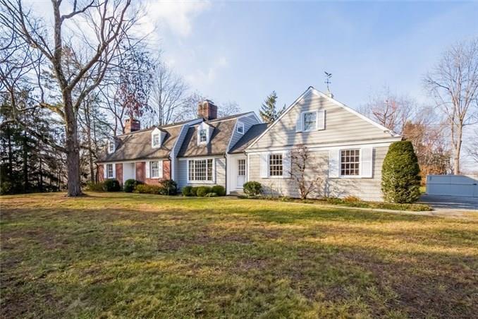 32 Lewis Drive Ridgefield, CT 06877 - Photo 1 of 1 a front view of a house with a yard
